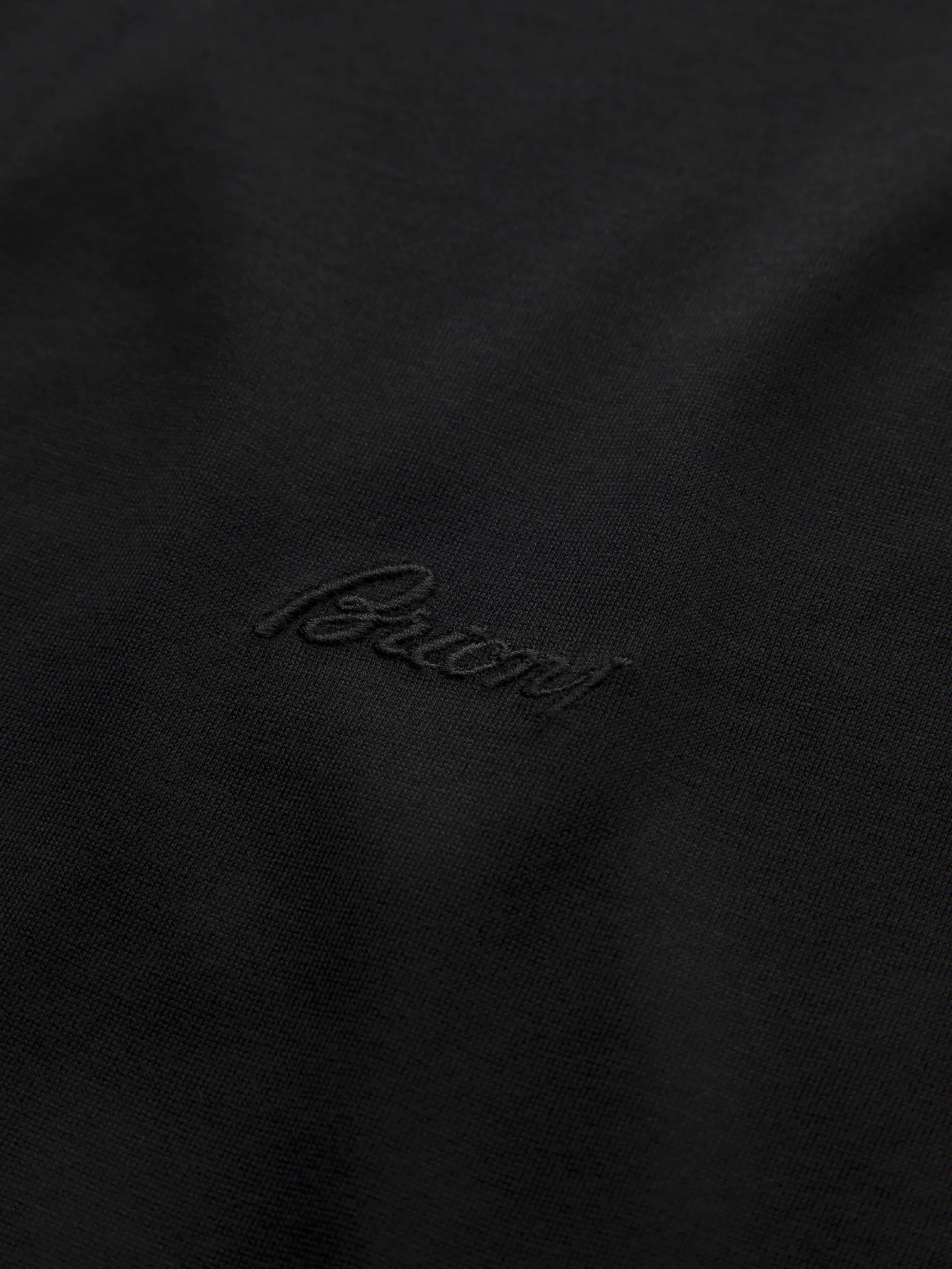 Black cotton zip polo