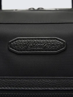Black nylon and grained leather travel tote