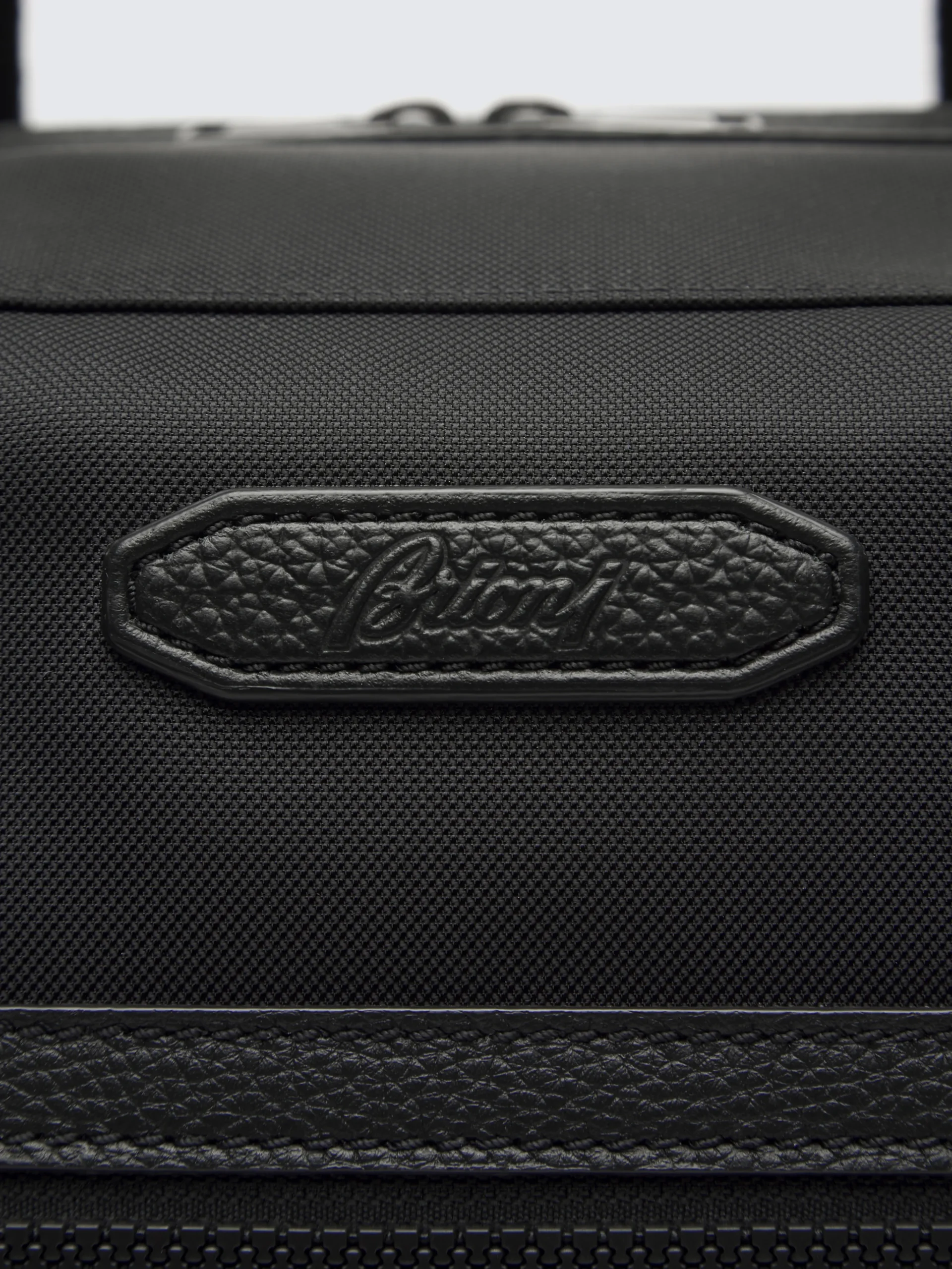 Black nylon and grained leather travel tote