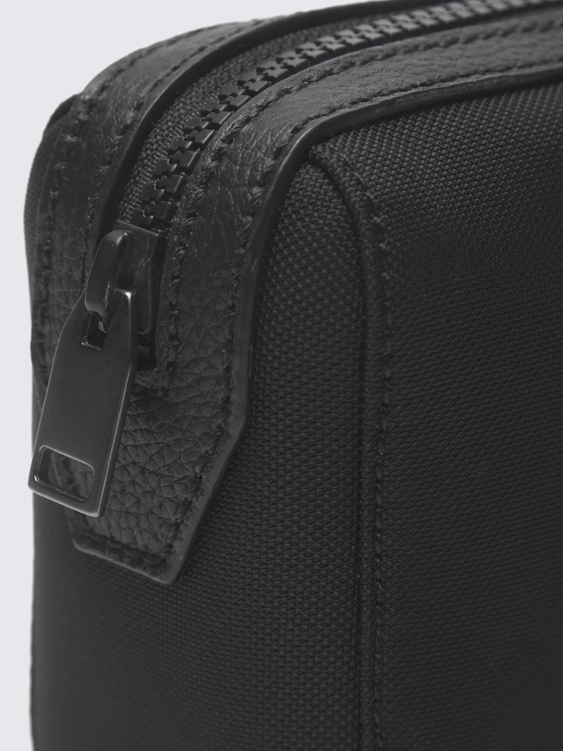 Black nylon and grained leather bi-material beauty case