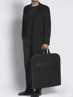 Black nylon and grained leather garment bag
