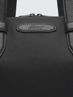 Black nylon and grained leather city bag