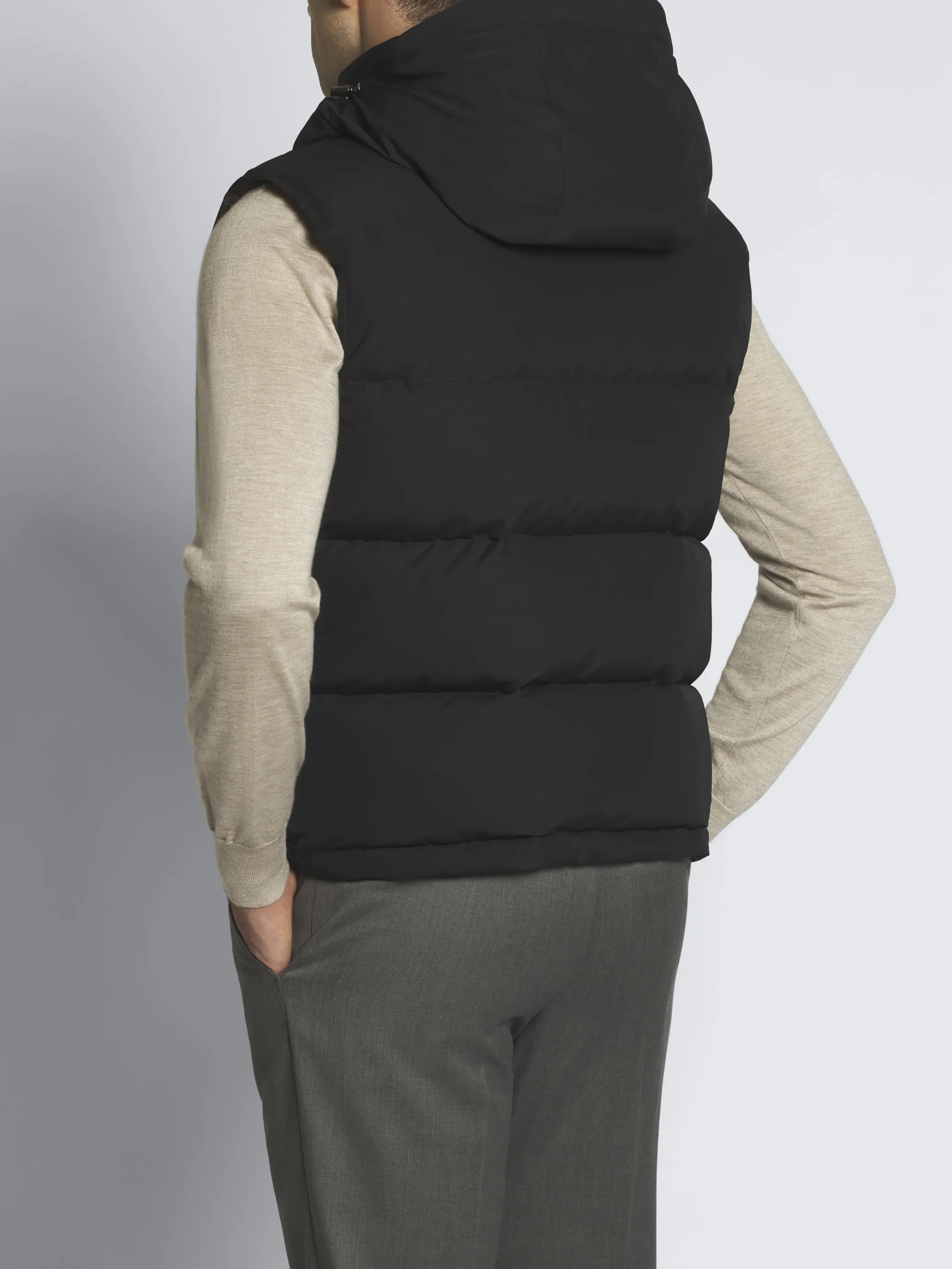 Black quilted and padded vest in technical wool