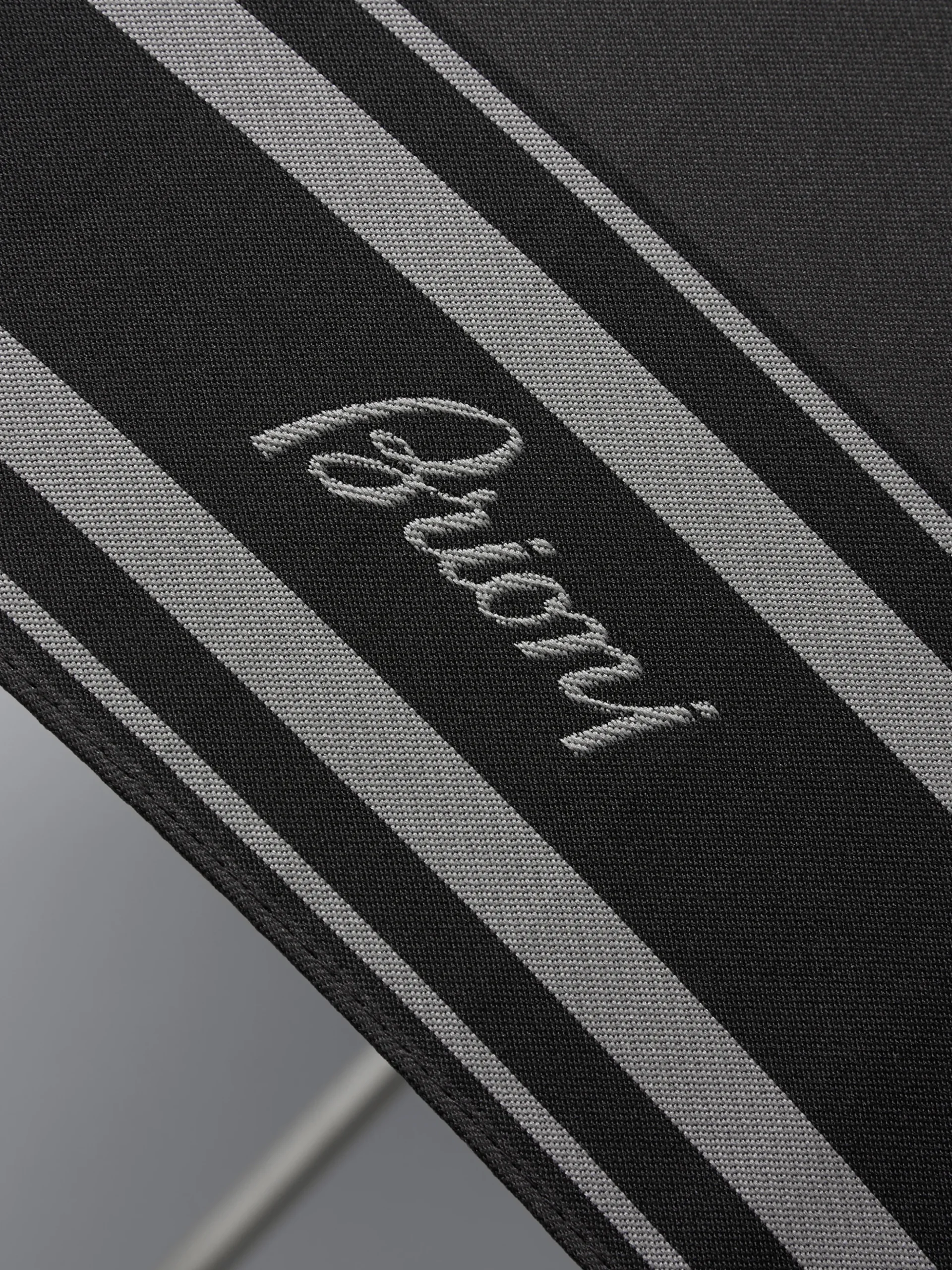 Grey and black foldable umbrella