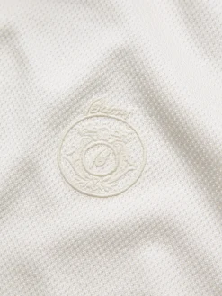 Ivory white silk and cotton jersey half-zip mockneck sweater